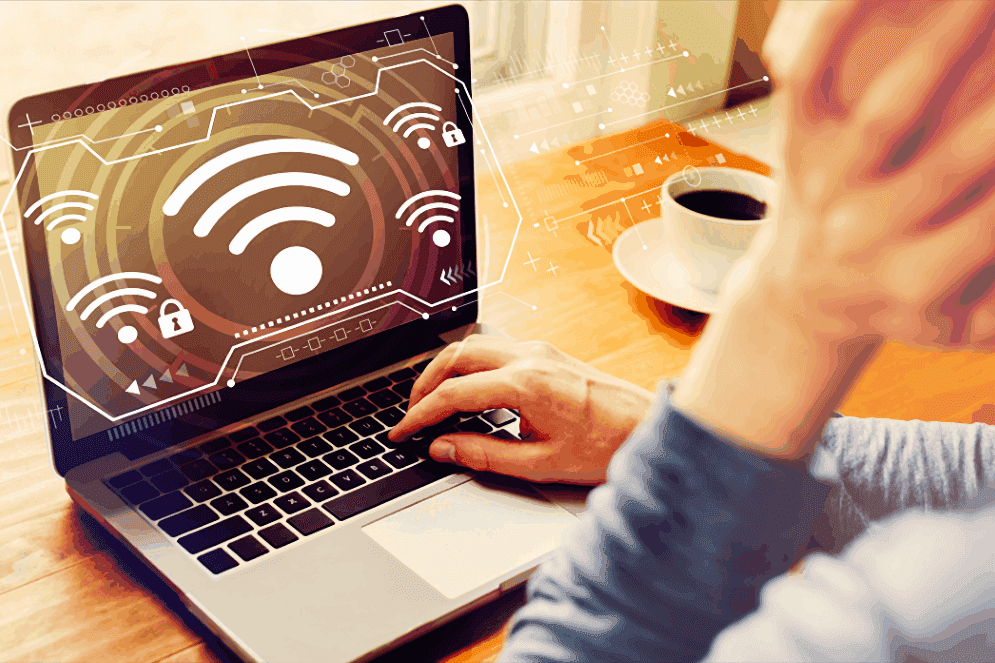 a person uses a laptop with a WiFi signal on the screen