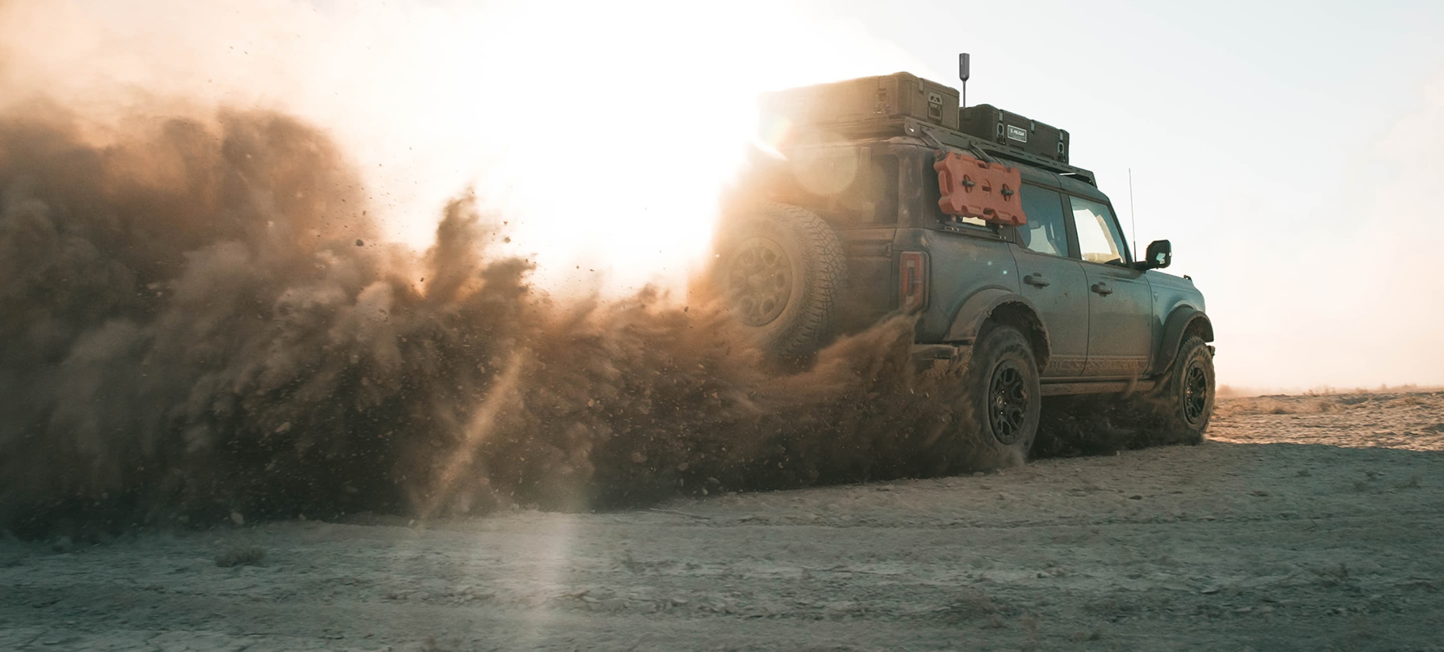 truck kicking up dirt