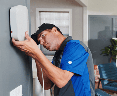 Man installing booster