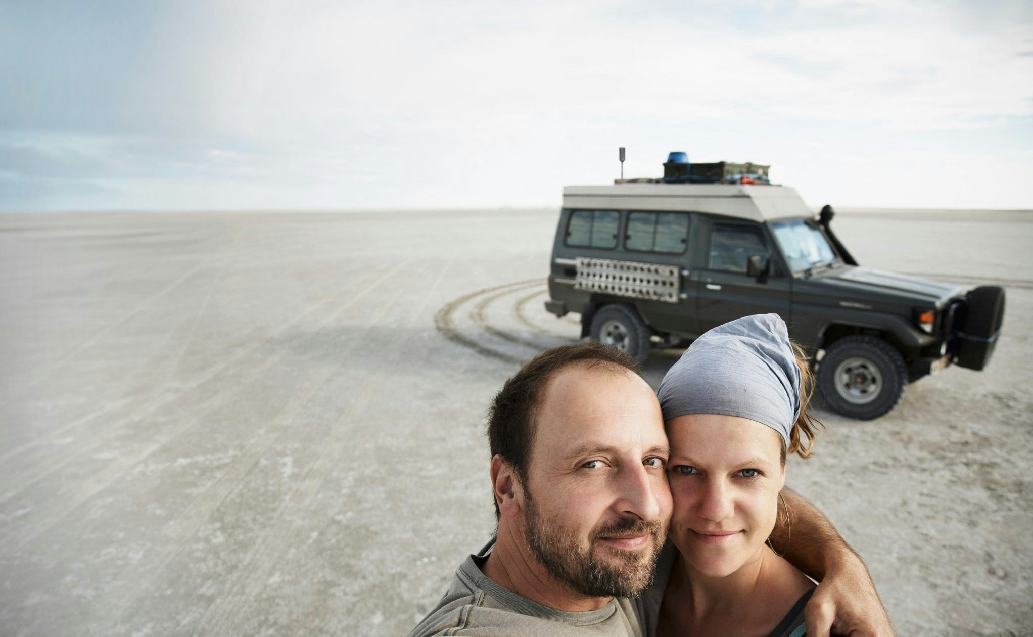 couple and their overland rig